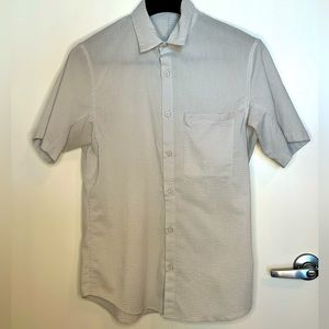 Men’s lululemon button down with zipper pocket.